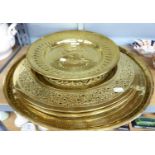 THREEE INDIAN BRASS CIRECULAR WALL PLAQUES, TWO WITH PEIRCED EDGE TRAY 20" DIAMETER AND ONE