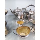 ELECTROPLATE COFFEE SERVICE OF FOUR PIECES HAVING HALF GADROONED DESIGN EBONISED HANDLES (4)