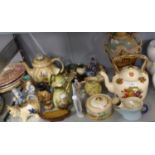 A POTTERY COW CREAMER, A LARGE VICTORIAN POTTERY TWO HANDLED VASE, AND A TEAPOT DECORATED WITH