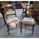 A SET OF SIX BEECHWOOD LADDERBACK SINGLE CHAIRS WITH RUSH SEAT AND NEEDLEWORK HANDMADE SQUAB
