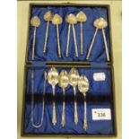 A SET OF E.P. TEASPOONS AND SUGAR BOWS AND EIGHT TEASPOONS WITH HEART SHAPED BOWLS IN PLUSH LINED