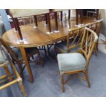 AN OAK AND BAMBOO EXTENDING DINING/CONSERVATORY TABLE WITH TWO EXTRA LEAVES AND A SET OF EIGHT