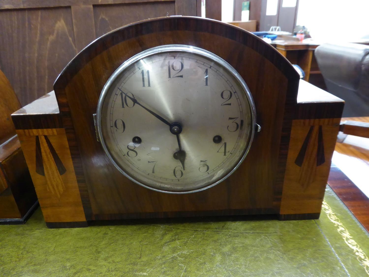 AN ART DECO INLAID WALNUTWOOD CASED 8 DAYS CHIMING AND STRIKING MANTEL CLOCK