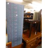 TWENTIETH CENTURY NEST OF TABLES HAVING SERPENTINE TOPS, DARK OAK WALL SHELVES AND A LLOYD LOOM