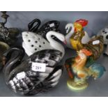 A PAIR OF POTTERY SWANS, TWO POTTERY SWAN FLOWER RECEIVERS, A GLAZED POTTERY COCKEREL AND A