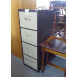 A METAL FOUR DRAWER FILING CABINET