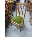 SET OF 10 HARDWOOD SINGLE CHAIRS EACH WITH TALL FIVE SPINDLE BACKS. DROP IN SEATS IN MOSS GREEN