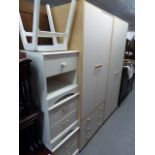 A PAIR OF MFI WARDROBES, ONE WITH TWO DOORS, THE OTHER HAVING THREE DRAWERS BELOW TWO DOORS, THREE