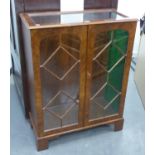 A 1930's WALNUTWOOD DISPLAY CABINET WITH TWO GLASS SHELVES