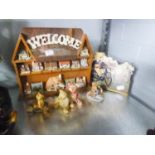 A COLLECTION OF MODERN POTTERY TEDDY BEAR FIGURES WITH ADVERTISING BOARD AND A COLLECTION OF