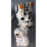 A PAIR OF TWENTIETH CENTURY BURLEIGH WARE STAFFORDSHIRE POTTERY MANTEL DOGS, 7 1/2" HIGH AND ANOTHER