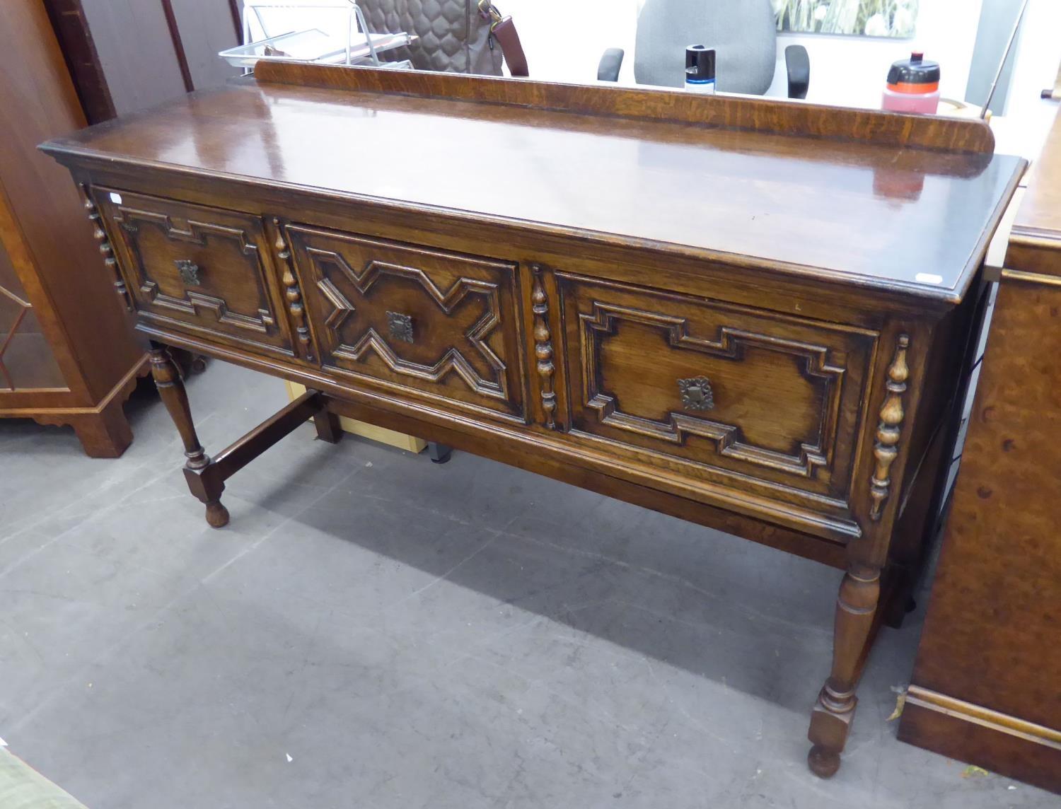 JACOBEAN STYLE OAK DRESSER WITH ROW OF THREE DEEP DRAWERS WITH MOULDED FRONTS, ON TURNED LEGS, 5'