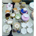 A SELECTION OF DECORATIVE CUPS AND SAUCERS, A MINIATURE ROYAL WORCESTER BASKET, AND VAROUS OTHER