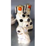 A PAIR OF TWENTIETH CENTURY BURLEIGH WARE STAFFORDSHIRE POTTERY MANTEL DOGS, 7 1/2" HIGH AND ANOTHER