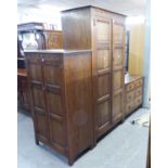 WARING & GILLOWS (1932) OAK TWO DOOR CARVED WARDROBE, (189cm high, 97cm wide) A MATCHING TALLBOY/