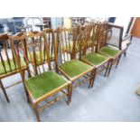SET OF FOUR HARDWOOD SINGLE CHAIRS EACH WITH TALL SPINDLE BACKS AND DROP-IN SEATS IN GREEN PLUSH