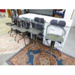 TWO TALL INDUSTRIAL MACHINISTS CHAIRS, ON FOUR SPUR BASE AND WITH RUBBER SEATS (AS FOUND) AND