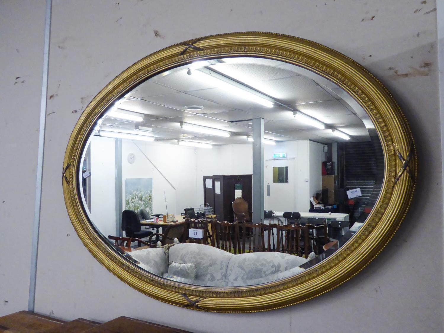 OVAL GILT FRAMED BEVELLED WALL MIRROR, 39" (99CM) ACROSS