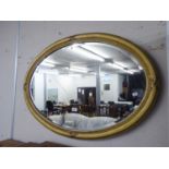 OVAL GILT FRAMED BEVELLED WALL MIRROR, 39" (99CM) ACROSS