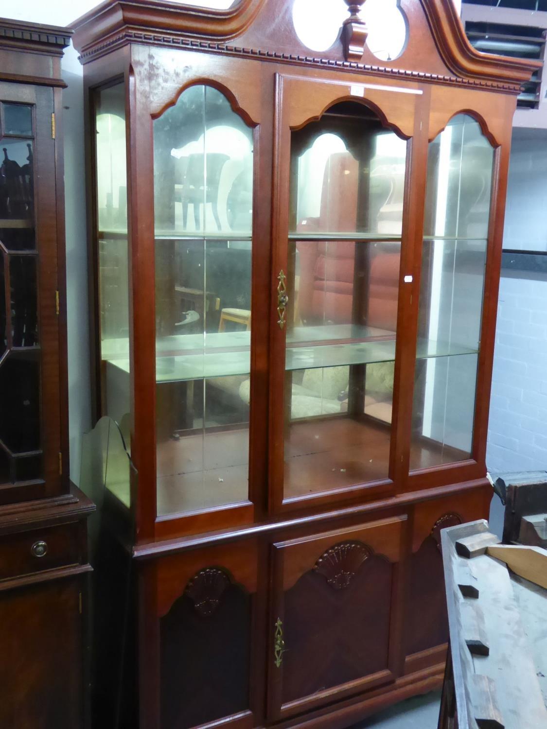 GEORGIAN STYLE MAHOGANY DISPLAY CABINET WITH BROKEN ARCH PEDIMENT, MIRRORED INTERIORS, CUPBOARD BASE - Image 2 of 2
