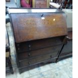 A MID TWENTIETH CENTURY OAK DROP LEAF TABLE, ON BARLEY TWIST SUPPORTS AND A SIMILAR STYLE BUREAU