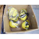 SIX YELLOW SAFETY HELMETS WITH VISORS, TWO WITH NECKGUARDS