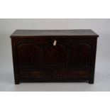 EIGHTEENTH CENTURY OAK DOWER CHEST, the moulded oblong, hinged top set above a triple panelled front