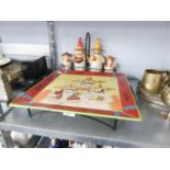 SET OF FOUR MEXICAN FIGURE SAUCE BOTTLES AND HOLDER AND A LARGE PLATE AND TRAY.