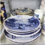 A SMALL COLLECTION OF DELFT RACK PLATES WITH DESIGN OF FISHERMAN, COBBLERS, HORSE CART ETC AND TWO