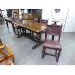 A GOOD QUALITY HEAVY OAK DINING ROOM SUITE OF 6 PIECES, VIZ, A TRESTLE DINING TABLE, FOUR DINING