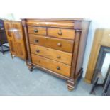 A LARGE VICTORIAN CHEST OF DRAWERS, TWO SHORT OVER THREE LONG DRAWERS AND A FRIEZE DRAWER ABOVE,