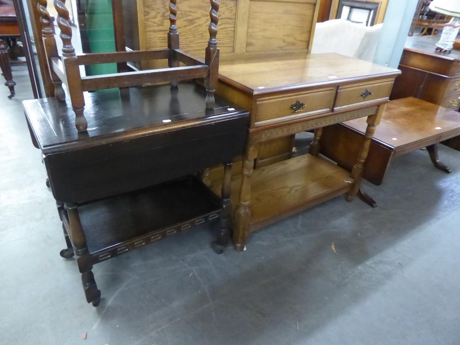 AN OAK SIDE TABLE, WITH TWO SHORT DRAWERS AND UNDERTIER AND AN OAK DROP-LEAF TEA TROLLEY (2)