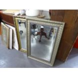 AN OBLONG GILT FRAMED BEVELLED EDGE WALL MIRROR AND AN SIMILAR MIRROR IN SILVERED FRAME (2)