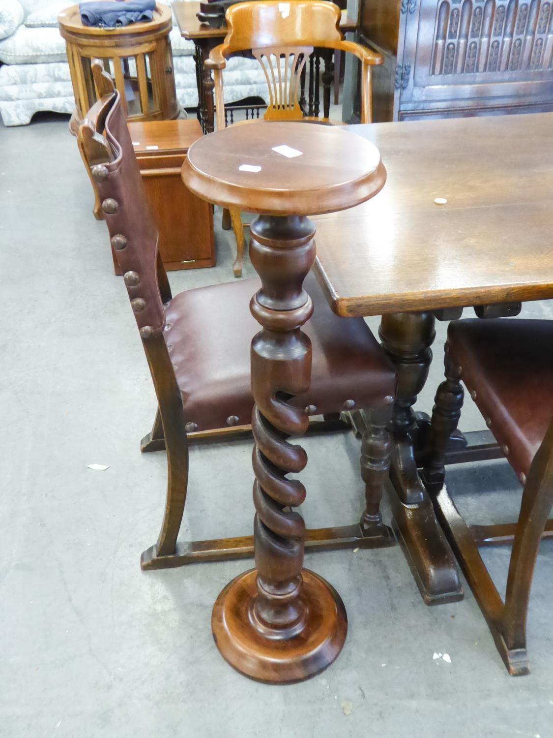 A MAHOGANY PLANT STAND, ON SPIRAL COLUMN