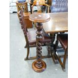 A MAHOGANY PLANT STAND, ON SPIRAL COLUMN