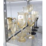SMALL SELECTION OF GLASSWARES TO INCLUDE A DECANTER, THREE CHAMPAGNE FLUTES, SIX SHERRY GLASSES,