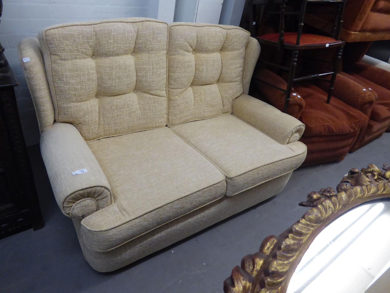 A TWO SEATER MODERN SOFA, PADDED THROUGHOUT WITH BUTTON BACKS IN CREAM CHENILLE FABRIC