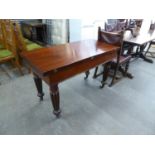 MAHOGANY OCCASIONAL TABLE WITH WAVY EDGE TOP ON CARVED TRIPOD LEGS