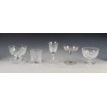 A SELECTION OF GLASSWARE including a decanter, water jugs, a part dressing table set, sundae and