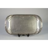 TUDRIC ?SOLKETS? PEWTER TWO HANDLED TRAY DESIGNED BY ARCHIBALD KNOX FOR LIBERTY & Co, of rounded