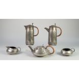 FIVE PIECE TUDRIC ?SOLKETS? PEWTER TEA AND COFFEE SERVICE DESIGNED BY ARCHIBALD KNOX FOR LIBERTY &