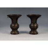 PAIR OF JAPANESE LATE MEIJI PERIOD BRONZE VASES, each of flared form, engraved with panels