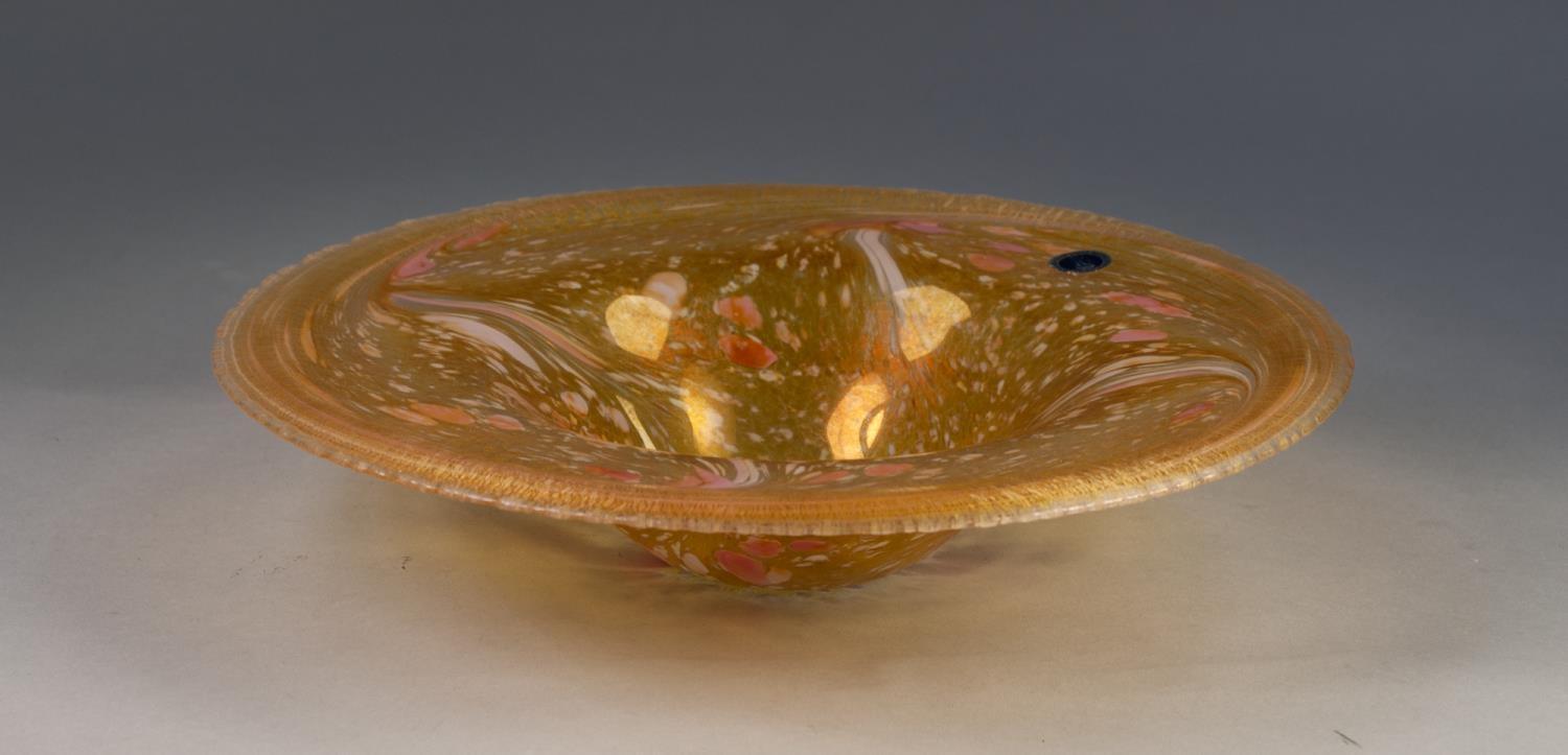 MIDSUMMER IRIDESCENT GLASS BOWL, of shallow, flared form, speckled in white and pink on an amber