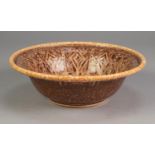 PILKINGTON?S ROYAL LANCASTRIAN CARVED POTTERY BOWL BY WILLIAM S MYCOCK, of flared, footed form,