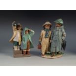 TWO LLADRO BUFF COLOURED CERAMIC MATT FINISH FIGURES each of two children 11" (28) high and slightly