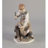 LLADRO FIGURE of a cobbler at work 9 3/4" (25cm) high