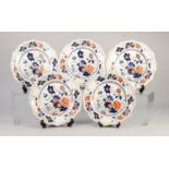 SET OF FIVE ?STONE CHINA? PLATES, each printed and washed with Oriental flowers, heightened in