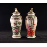 PAIR OF TWENTIETH CENTURY CHINESE FAMILLE ROSE PORCELAIN VASES AND COVERS, each of ovoid form with
