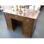 GEORGIAN STYLE OAK KNEEHOLE DESK, WITH RED LEATHER INSET TOP, HAVING TOP LONG DRAWER, TWO DRAWERS ON