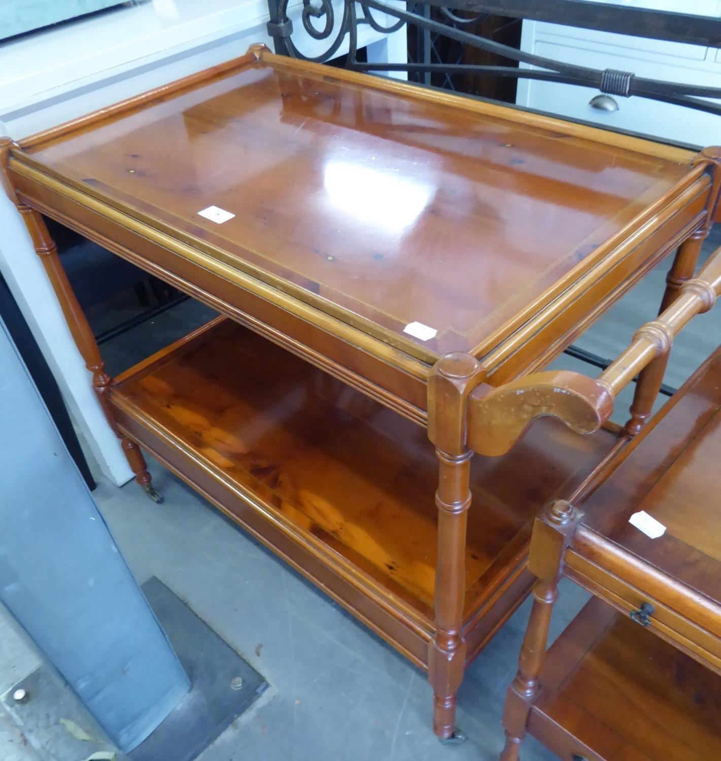 A REPRODUCTION MAHOGANY INLAID TEA TROLLEY